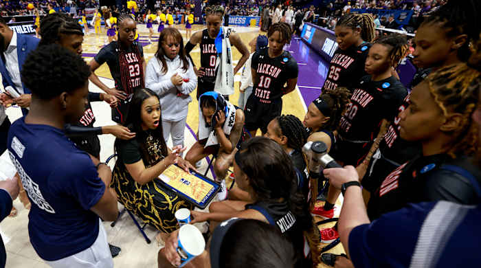 Jackson State coach Tomekia Reed speaks to her team during a NCAA tournament game against LSU.